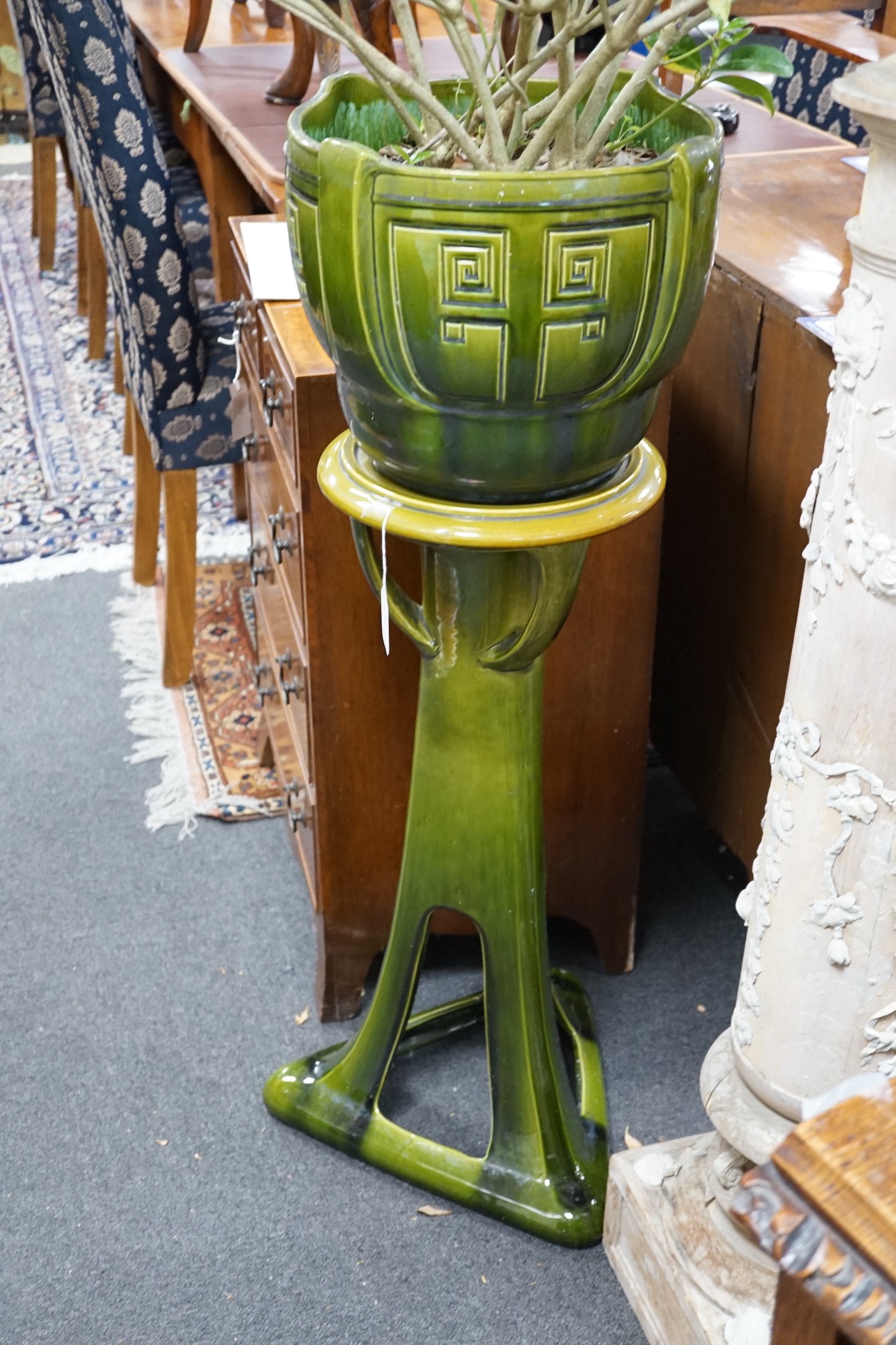 An Art Nouveau Bretby jardiniere on pedestal, 103cm tall excluding plant